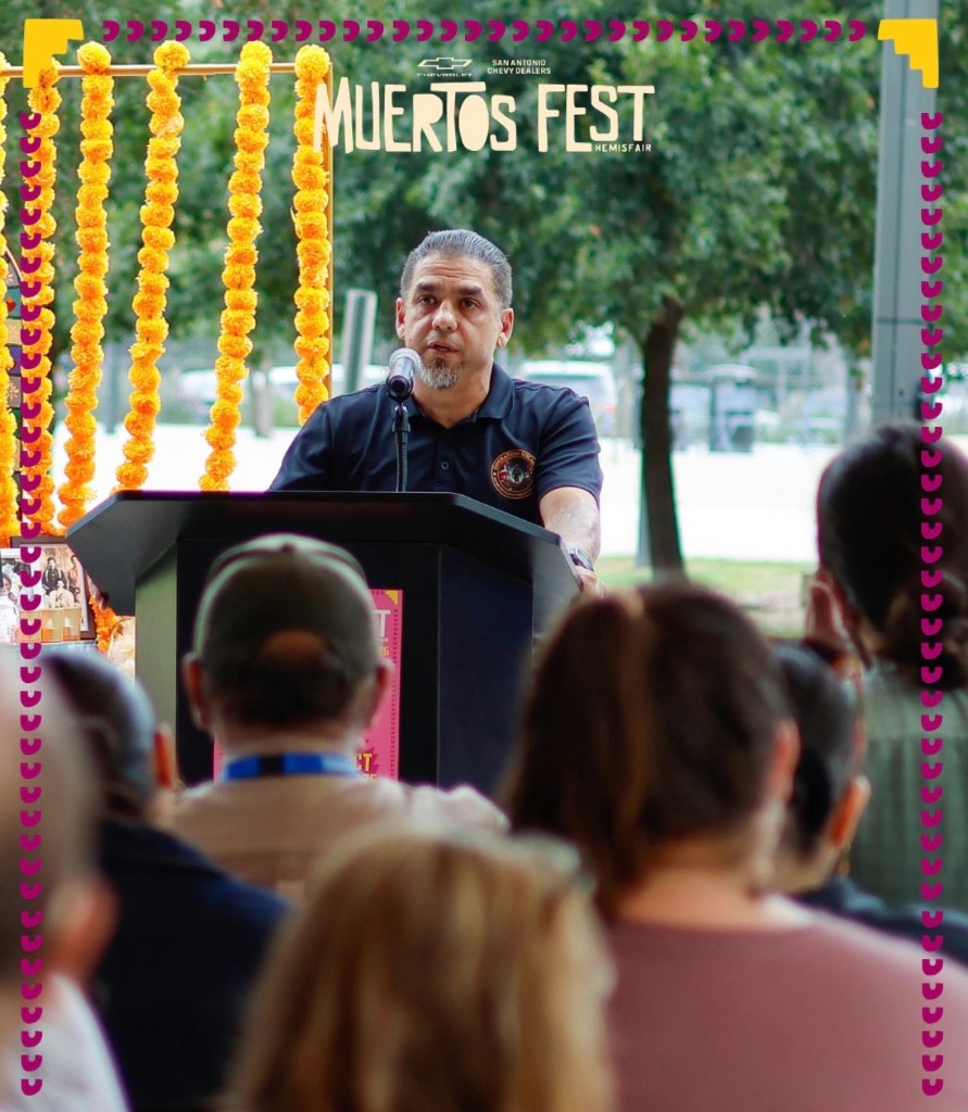 Gabriel Gonzales speaking at Muertos Fest in San Antonio.